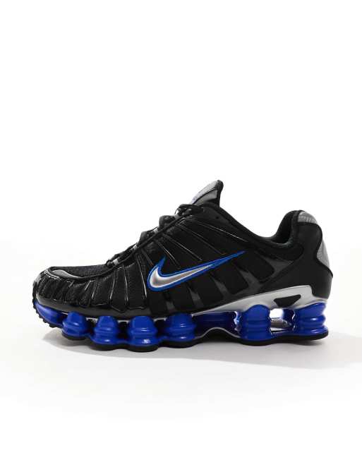Nike Shox TL sneakers in black and blue