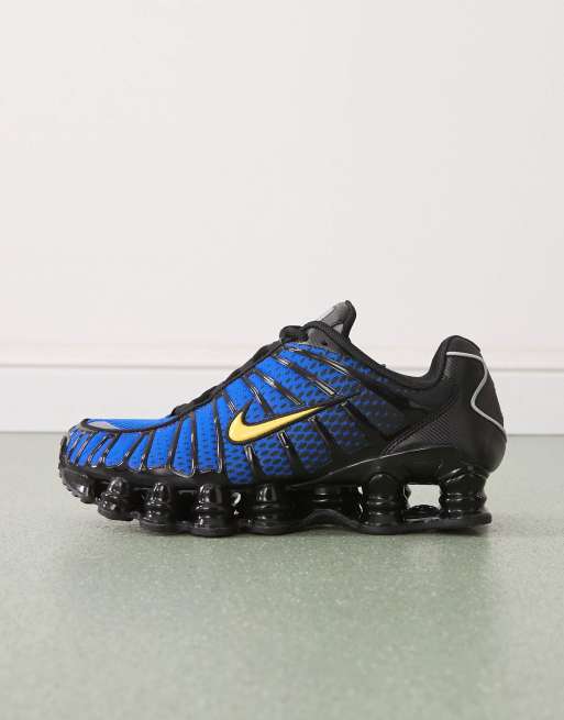 Nike Shox TL sneakers in black and blue