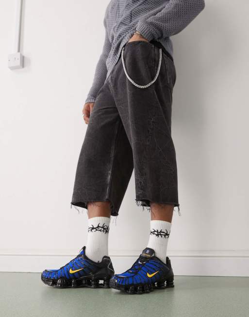 Nike Shox TL sneakers in black and blue