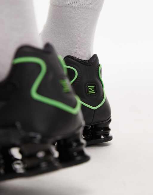 Nike Shox TL sneakers in black and green | ASOS