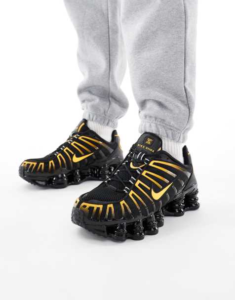 Nike Shox TL sneakers in black and orange - view 1