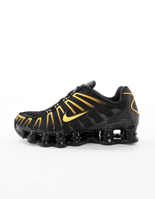 Nike Shox TL sneakers in black and orange