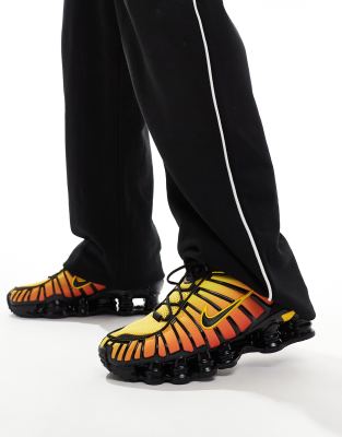 Nike Shox TL sneakers in black and red