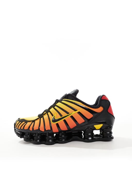 Nike Shox TL sneakers in black and red