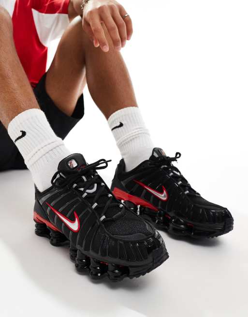 Nike Shox TL sneakers in black and red