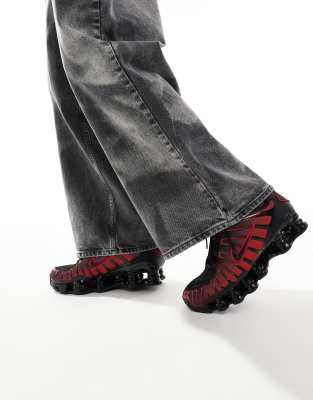 Nike Shox TL sneakers in black and red