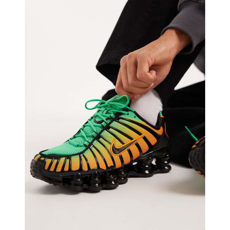 Nike Shox TL sneakers in black, green and orange | ASOS
