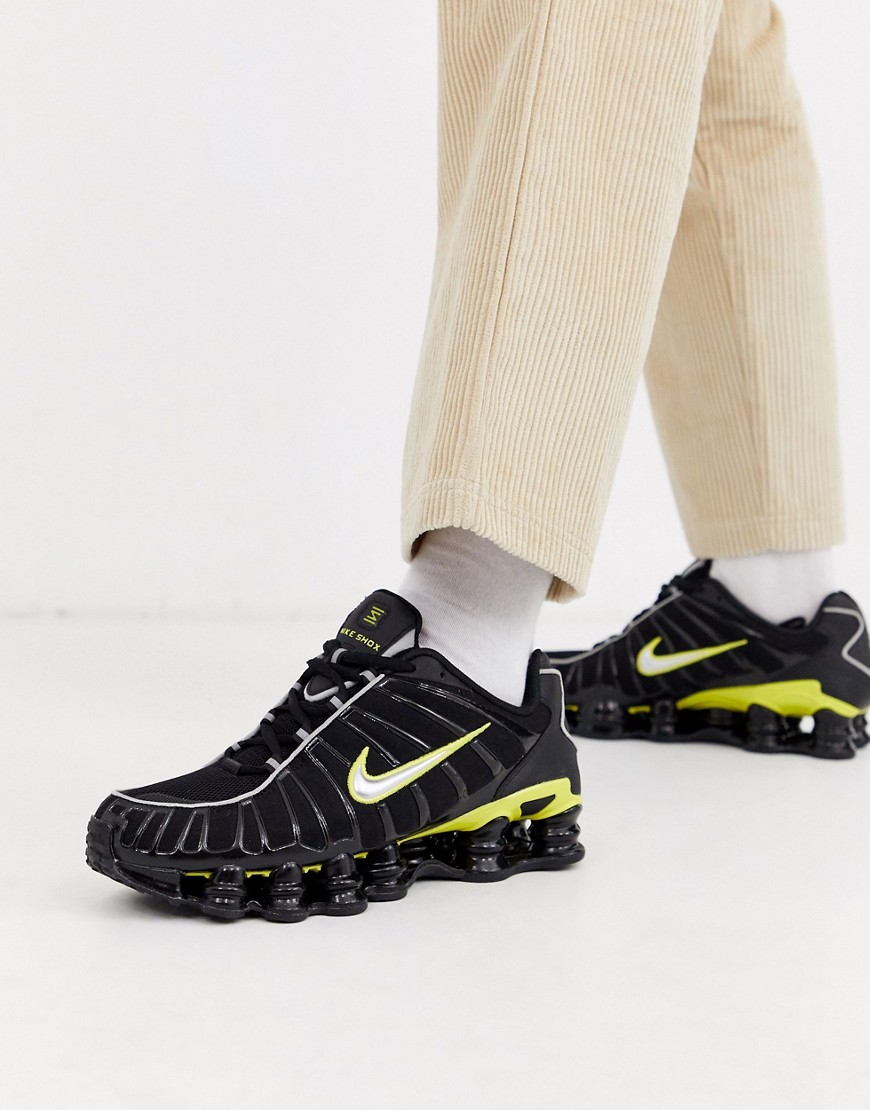 Nike - Shox TL - Sneakers in zwart en geel