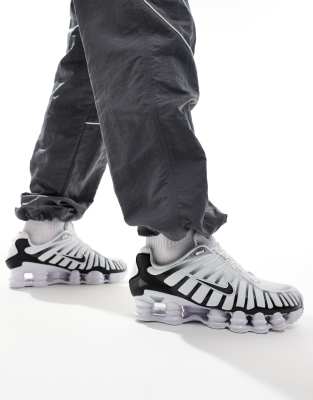 Nike Nike Shox TL trainer in white and black metallic