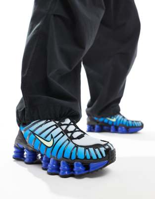 Nike Shox TL trainers in black and blue