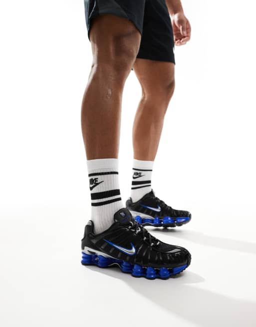 Nike Shox TL trainers in black and metallic silver 