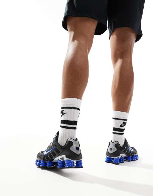 Nike Shox TL trainers in black and metallic silver 