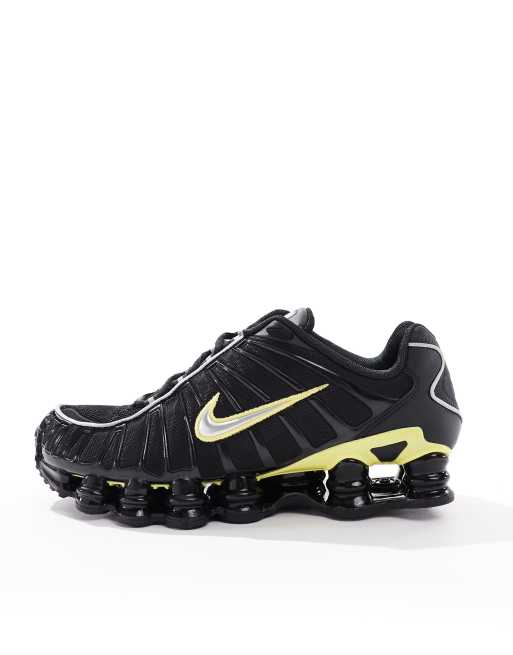 Nike Shox TL trainers in black and yellow