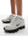 Nike Shox TL trainers in off-white and black