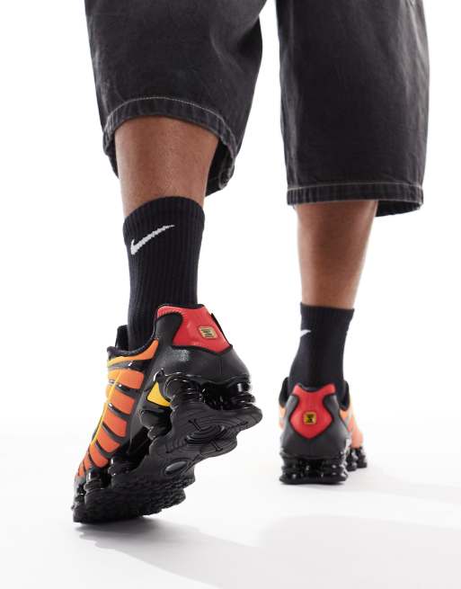 Nike Shox TL trainers in orange and black | ASOS