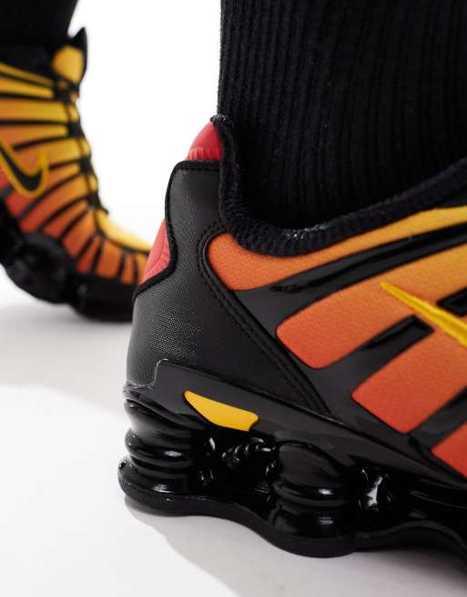 Nike Shox TL trainers in orange and black | ASOS