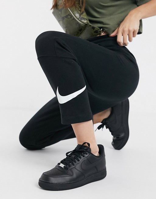 Nike slim leg Swoosh black joggers