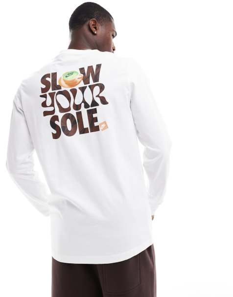 Nike – Slow Your Sole – Langärmliges Shirt in Weiß mit „Slow Your Sole“-Grafikprint - view 1