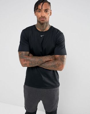 nike shirt with swoosh in middle