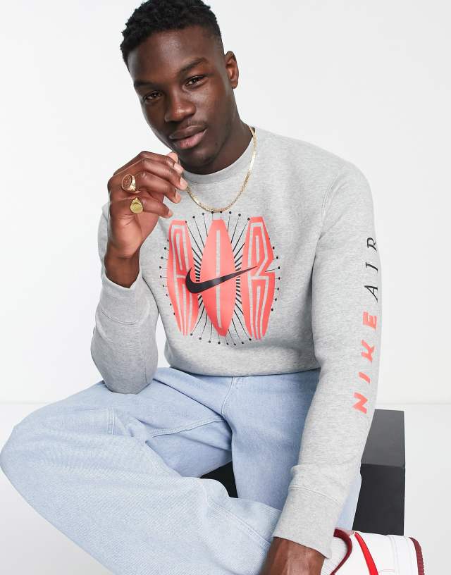 Nike Sneaker Obsessed retro graphic crew neck fleece sweatshirt in gray heather