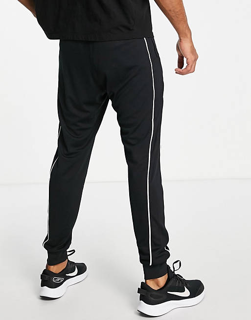 Nike Soccer Academy Dri-FIT cuffed sweatpants in black ASOS