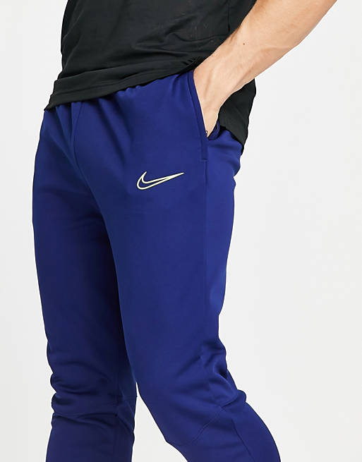 Nike Soccer Therma-FIT Academy polyknit pants in dark blue | ASOS