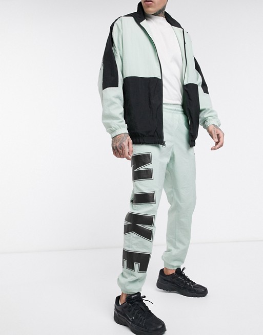 Nike Social Currency logo cuffed joggers in mint