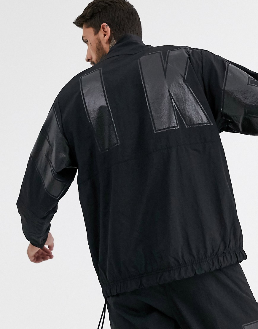Nike Social Currency logo windbreaker jacket in black