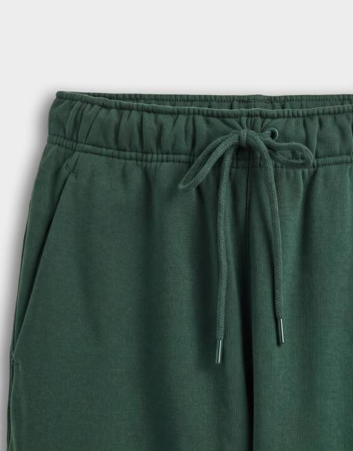 Nike Solo Fleece joggers con logo e fondo elasticizzato verde scuro, 8 di 9