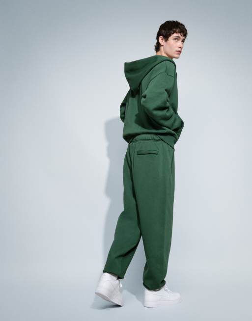 Nike Solo Fleece logo joggers met omslag in donkergroen, 4 van 9