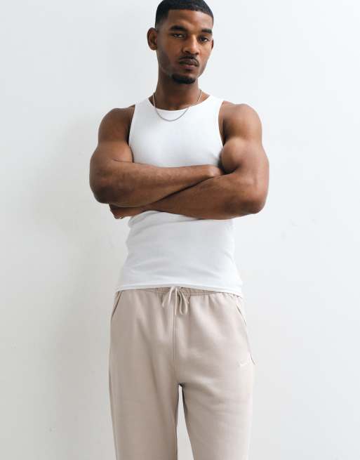 Nike Solo Fleece logo straight leg bungee joggers in light beige, 5 of 5
