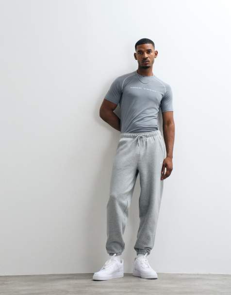 Nike Solo Fleece straight leg cuff joggers in light grey - view 1