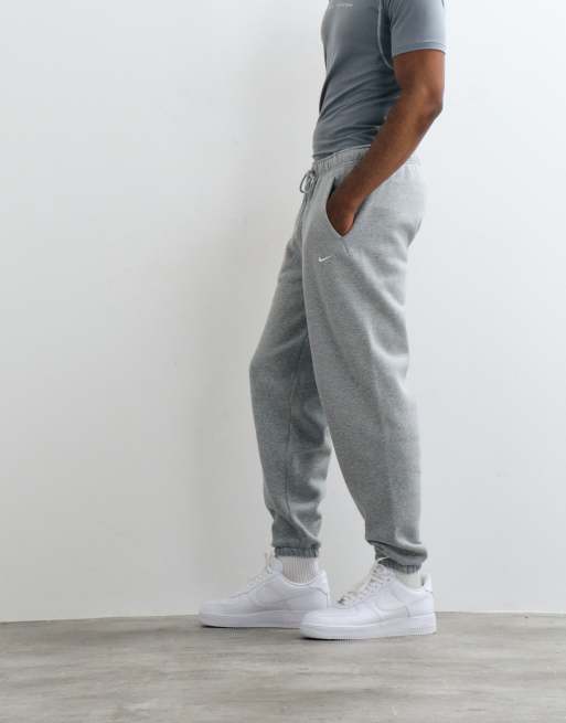 Nike Solo Fleece straight leg cuff joggers in light grey, 4 of 5