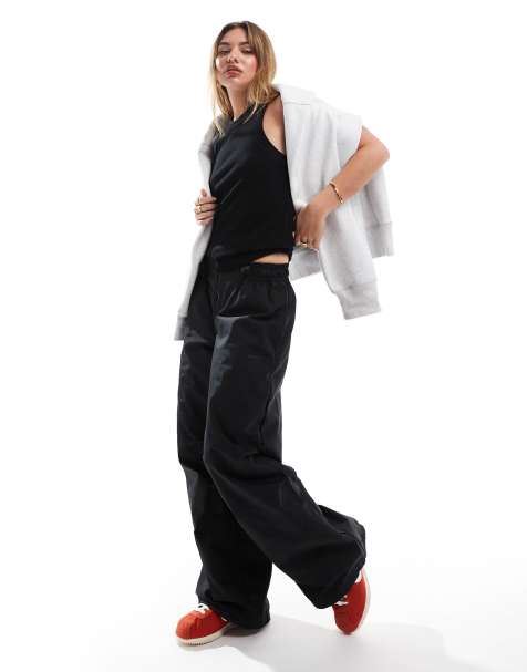 Nike - Sorte joggingbukser i fleece med lynlås foran - view 1