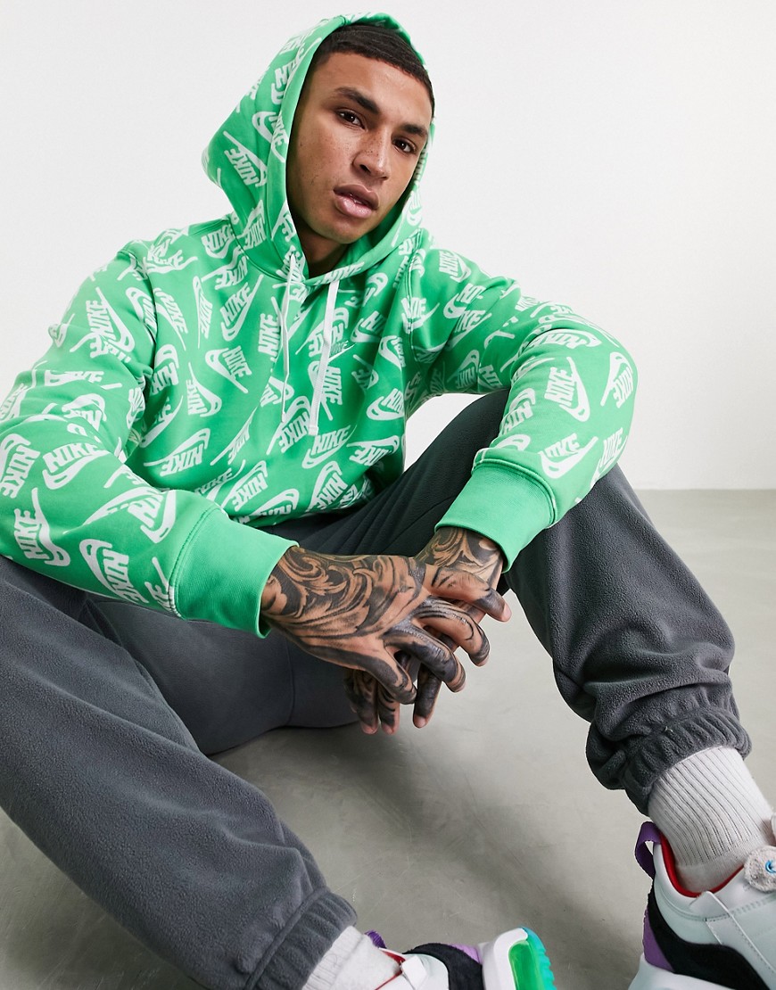 Nike Sport Essentials all over logo print fleece hoodie in green