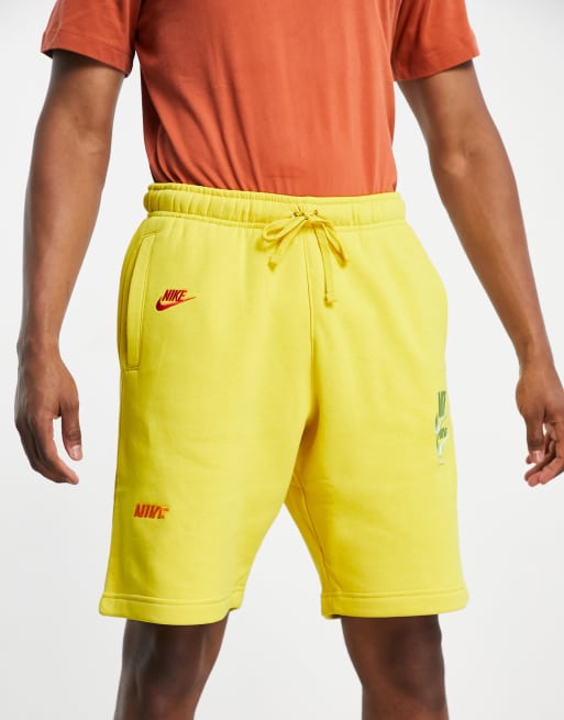 Nike yellow fleece store shorts