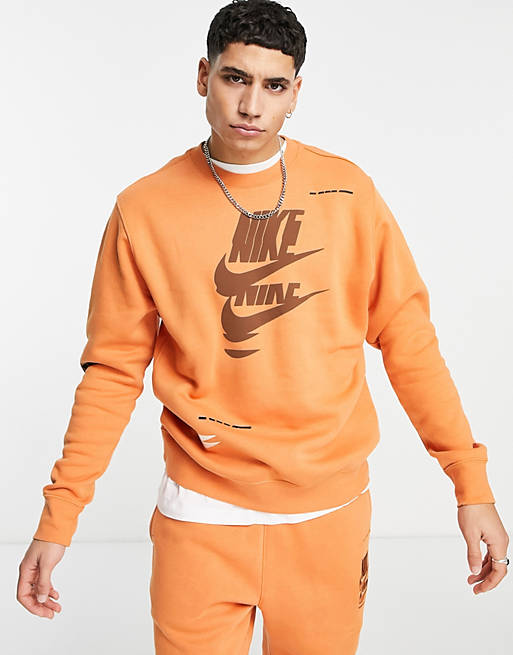 Nike Sport Essentials Multi Futura logo fleece sweatshirt in orange
