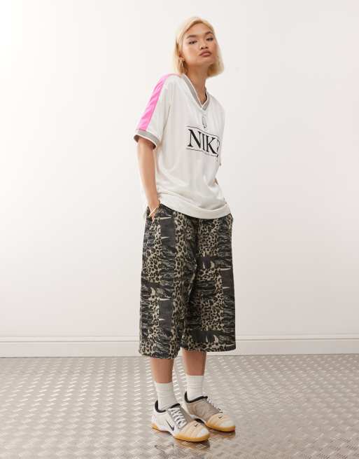 Nike Sport oversized graphic jersey in off white and pink