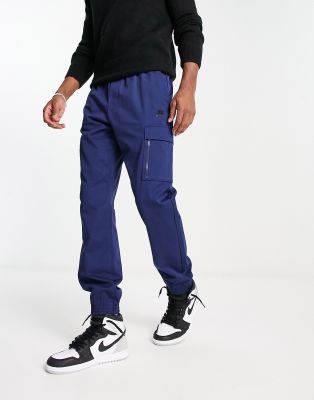 Nike Club woven straight leg trousers in stone