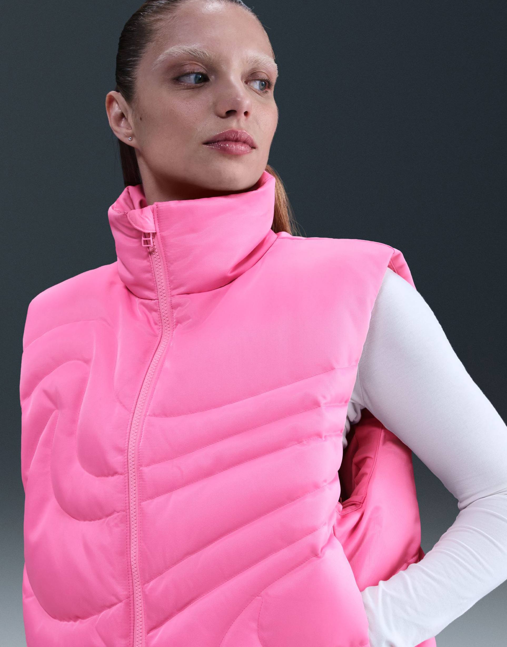 nike sports down swoosh puffer vest in pink