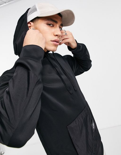 Nike Sports Utility cargo pocket hoodie in black | ASOS