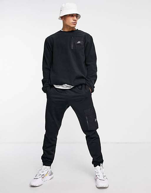 Nike Sports Utility cargo pocket sweatshirt in black | ASOS
