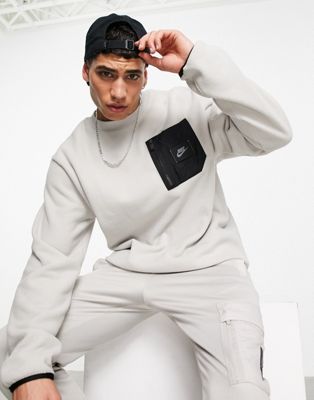 Nike Sports Utility cargo pocket sweatshirt in light grey - ASOS Price Checker