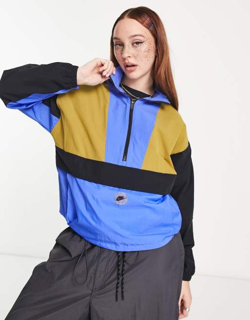 Sobriqueta Penetrar Prefijo Nike Sports Utility graphic packable quarter zip jacket in blue and moss  beige | ASOS