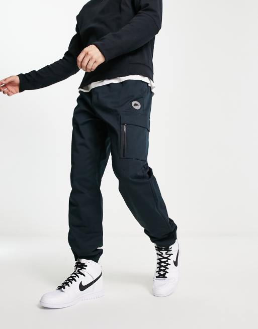 Nike - Sports Utility - Joggingbukser i sort/blå
