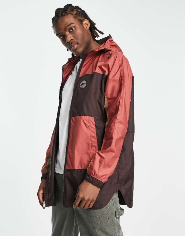 Nike Sports Utility zip through 'pac-a-mac' jacket in cargo red