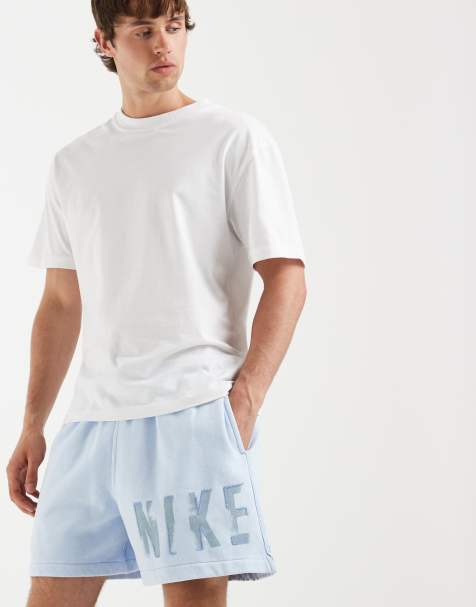 Nike Sportswear Club shorts with elasticated waist in light blue
