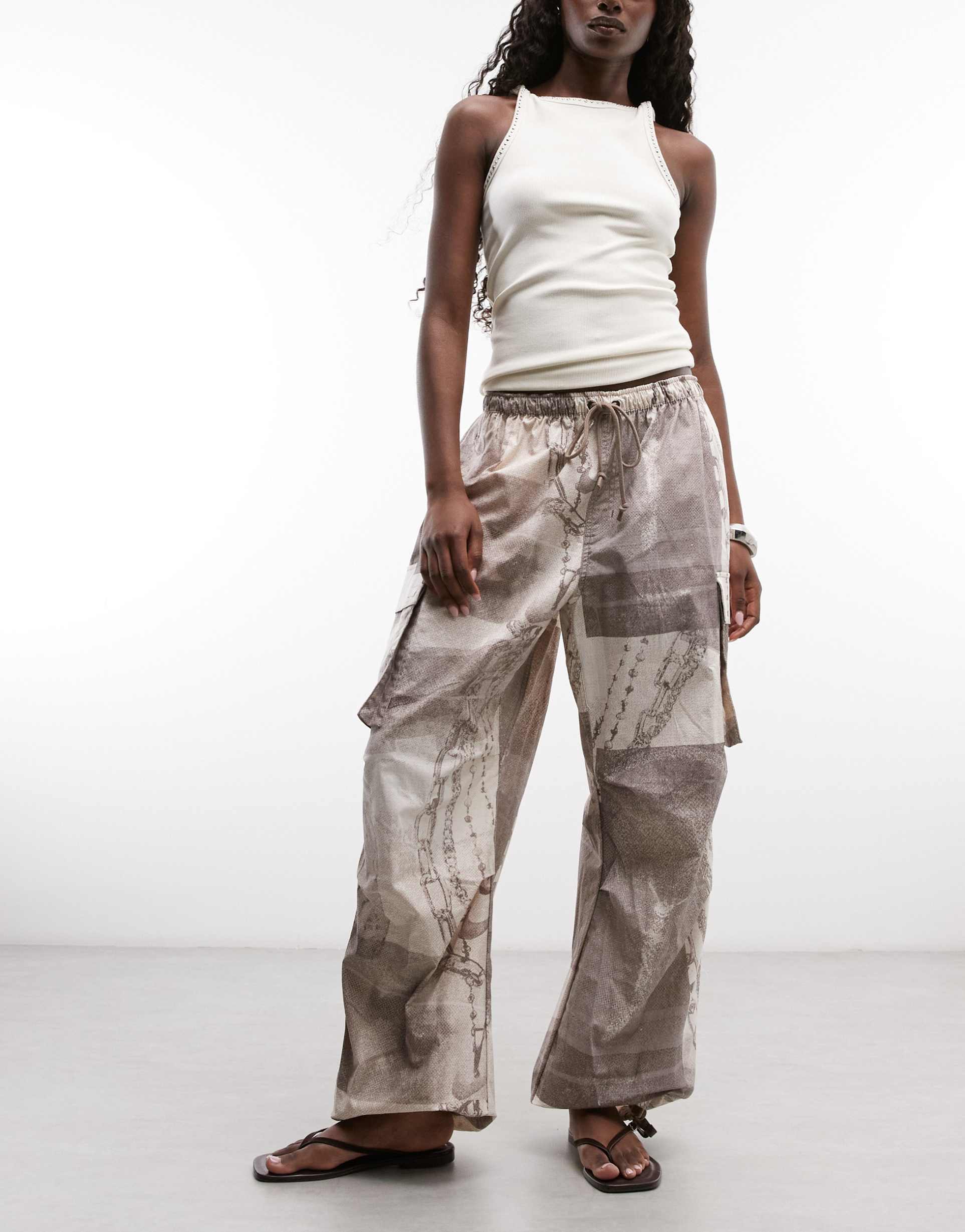 nike sportswear dance camouflage print pants in brown