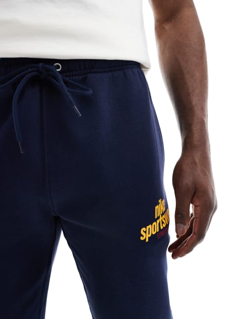Nike Sportswear logo sweatpants in navy