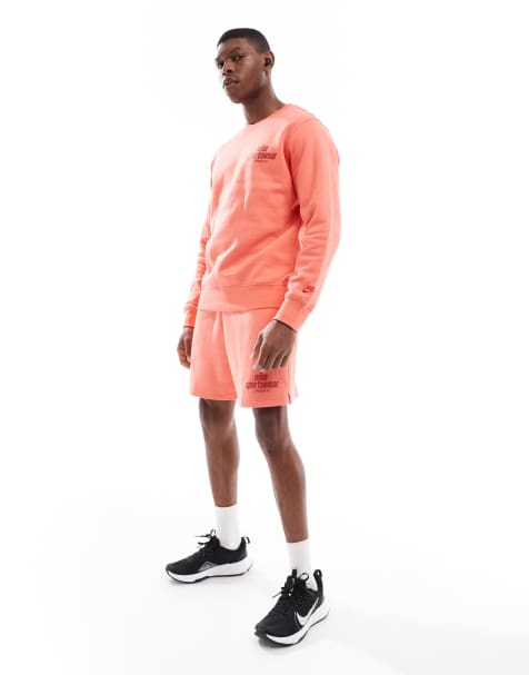 Nike Sportswear logo sweatshirt and shorts in orange - view 1